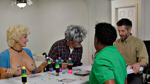 Mature deepthroats BBC and rides it with her shaved cunt