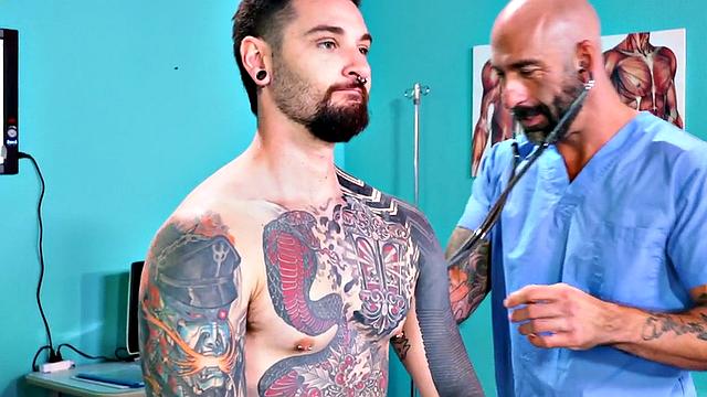 Fisting doctor fucks and fists jock in infirmary 3some