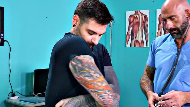 Fisting doctor fucks and fists jock in infirmary 3some