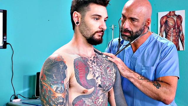 Fisting doctor fucks and fists jock in infirmary 3some