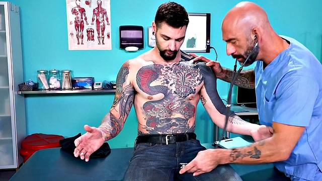 Fisting doctor fucks and fists jock in infirmary 3some