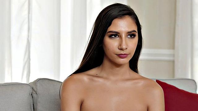 Athletic brunette coed gets off by sucking and riding a big cock on the couch