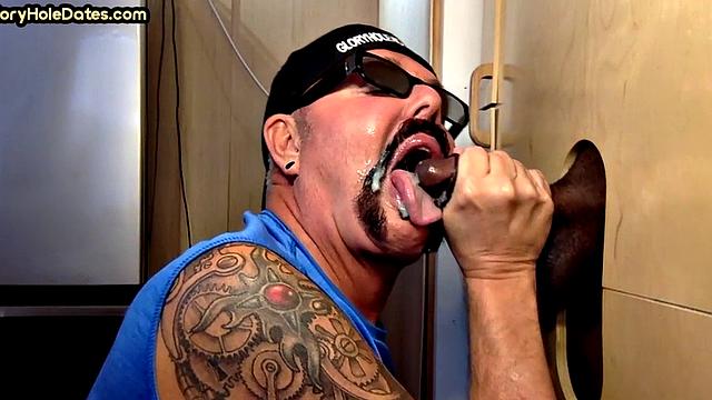 Real cum addict sucks black cock in gloryhole at home