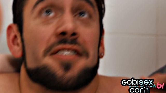 pierced babe gives head to 2 dicks