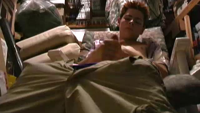 Redhead 18 year old skater Rusty Clark has found a comfortable chair in the storage room to drop his pants and jack off. This young man has a very high sex drive, so he's gotten good at finding places to quickly slip into and beat off.