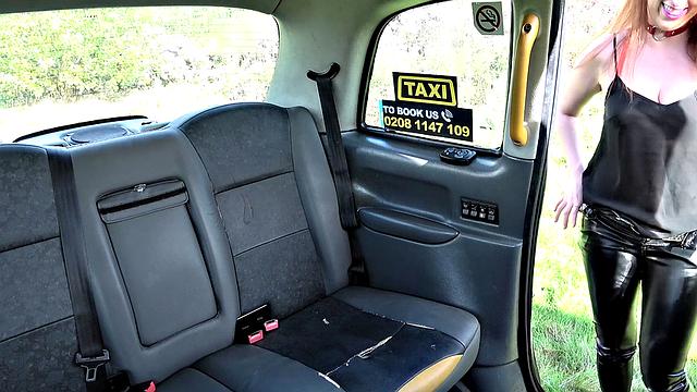 Ginger bush-haired babe with big tits takes a hard pounding in the backseat of a taxi