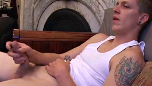 Shane slips out of his clothes and begins massaging his stiff cock. Along the way, he gives us a nice view of his butt hole and eats some of his pre-cum. After some stroking, Shane spurts out a geyser of fresh warm cum.