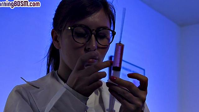 Sub anal nurse with ballgagged mouth rough by patient