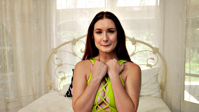 Young brunette Violet smiles as she fingers her tight, wet pussy.