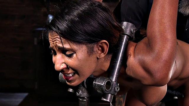 Predicament bondage babe gets spanked over whole body