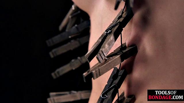 Hardtied babe toyed by her master