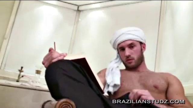 Latin hunks transform into Arabian Knights for this fantasy gay scene. After a bit of making out, Nabih Sirajh has his lips around Murad Muti's fat cock. Nabih does his best.