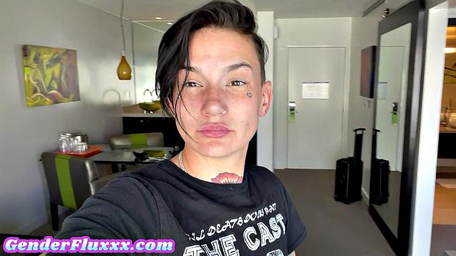 Inked genderfluid pounding with strapon