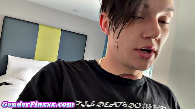 Inked genderfluid pounding with strapon