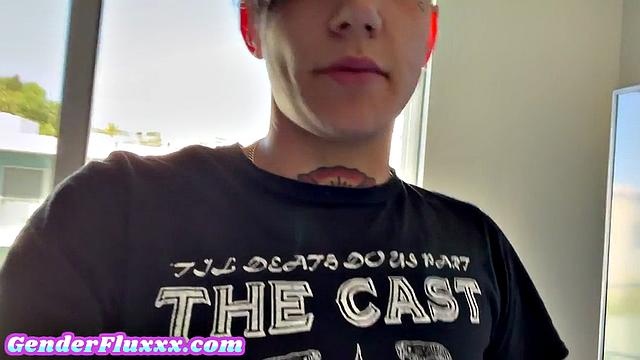 Inked genderfluid pounding with strapon