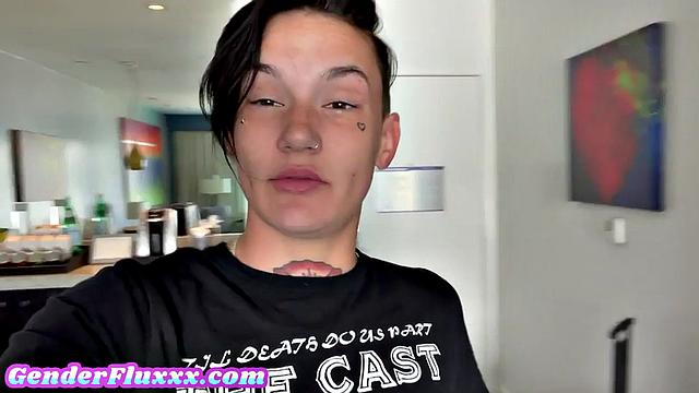 Inked genderfluid pounding with strapon