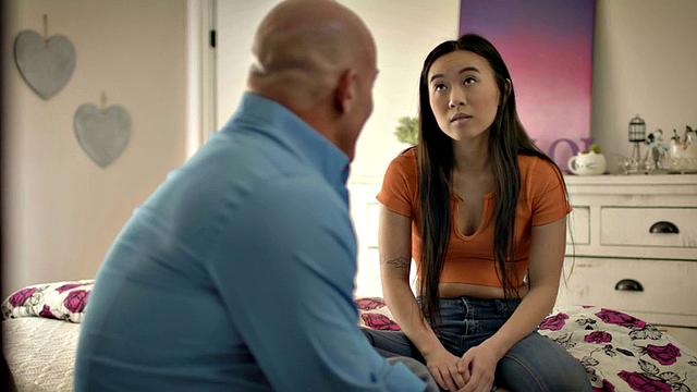 Asian stepdaughter riding stepdad