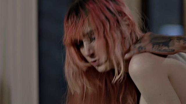 Busty TS babe with colored hair barebacked by BF