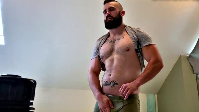 Muscular dude with tattoos jerks off and fingers his way to a hot load