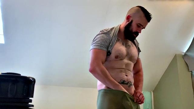 Muscular dude with tattoos jerks off and fingers his way to a hot load