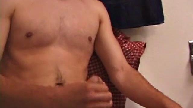 Marcus makes a manly impression as he slips away to the bathroom with his laptop to catch a little private time. He gets really into the porn he's watching and strips off his red boxers.