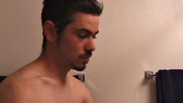 Marcus makes a manly impression as he slips away to the bathroom with his laptop to catch a little private time. He gets really into the porn he's watching and strips off his red boxers.