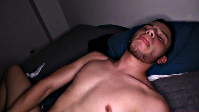 We look in on Vasco, who is stripped to his underwear and kicked back on a bed. He pulls his cock out and quickly gets it hard. Then the horny Latino gets completely naked, before getting down to business.