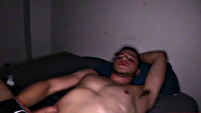 We look in on Vasco, who is stripped to his underwear and kicked back on a bed. He pulls his cock out and quickly gets it hard. Then the horny Latino gets completely naked, before getting down to business.