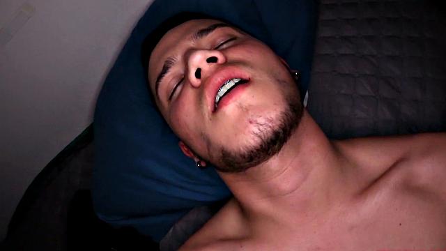 We look in on Vasco, who is stripped to his underwear and kicked back on a bed. He pulls his cock out and quickly gets it hard. Then the horny Latino gets completely naked, before getting down to business.