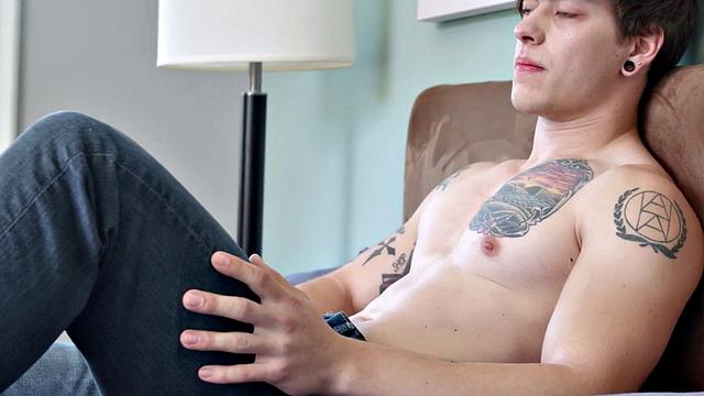 Athletic tattoo newbie wanking on bed for jizzshot