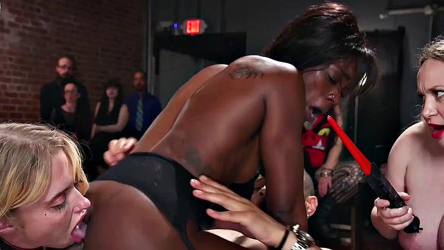 BDSM ebony babe enjoys BBC tormenting session in group