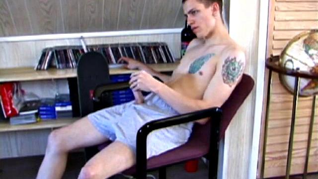 In this solo jerk off scene, young Shane strokes his hard cock to a porn video. He works that meat with determination, unloading warm cum onto his stomach.