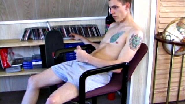 In this solo jerk off scene, young Shane strokes his hard cock to a porn video. He works that meat with determination, unloading warm cum onto his stomach.