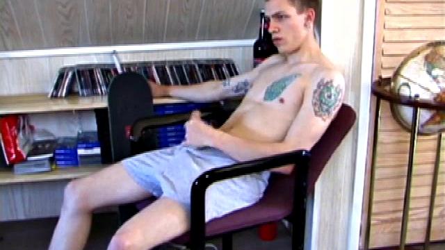 In this solo jerk off scene, young Shane strokes his hard cock to a porn video. He works that meat with determination, unloading warm cum onto his stomach.