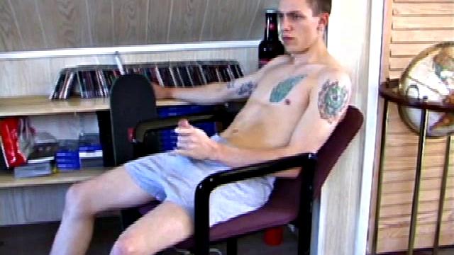 In this solo jerk off scene, young Shane strokes his hard cock to a porn video. He works that meat with determination, unloading warm cum onto his stomach.