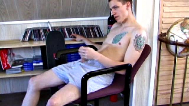 In this solo jerk off scene, young Shane strokes his hard cock to a porn video. He works that meat with determination, unloading warm cum onto his stomach.