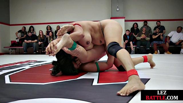 Muscular wrestling lesbians fingering
