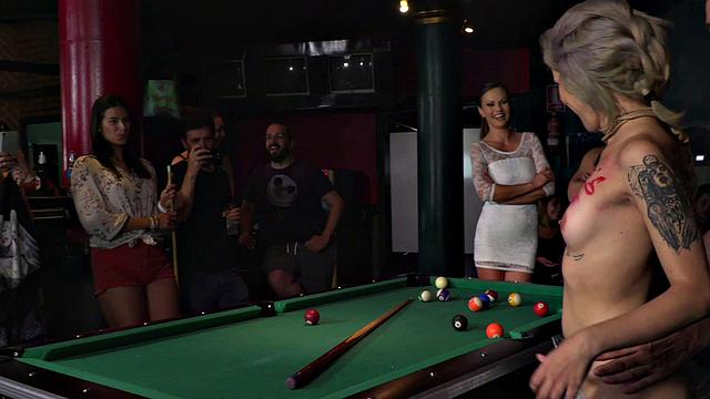 Public BDSM slut rims guy's asshole in front of voyeurs