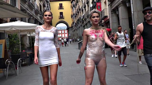 Public BDSM slut rims guy's asshole in front of voyeurs