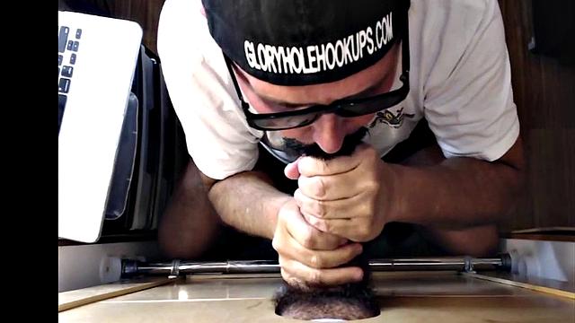 Mature gloryhole amateur blows BF's dick through hole