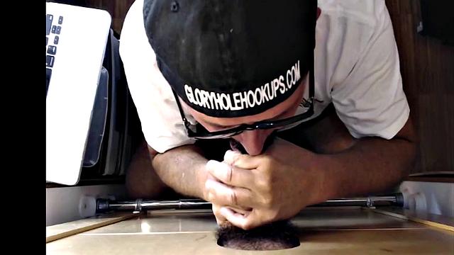 Mature gloryhole amateur blows BF's dick through hole