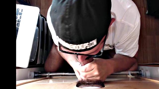 Mature gloryhole amateur blows BF's dick through hole