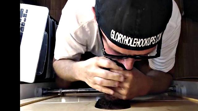 Mature gloryhole amateur blows BF's dick through hole