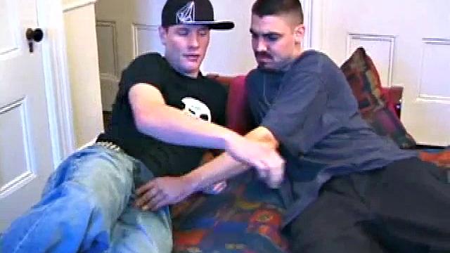 Sitting on the bed, Preston Woods and Sean DeRocc start rubbing each other's cocks, but the pants don't stay on for long. After they pull them off, Preston starts sucking Sean's dick.