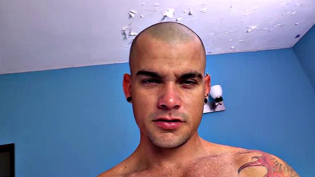 Big and beefy, Oscar is back for a solo jack off shoot, giving us an opportunity to focus on him and his big cock. With that shaved head, he can look a bit intimidating, which probably explains why he used to work as a cop.