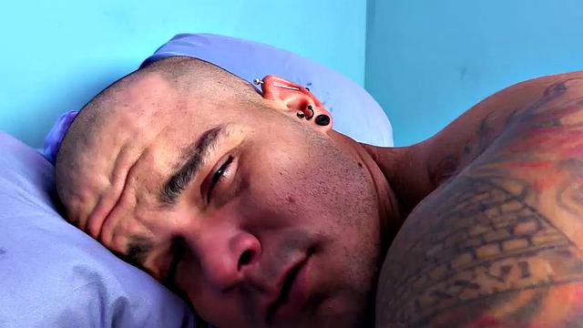 Big and beefy, Oscar is back for a solo jack off shoot, giving us an opportunity to focus on him and his big cock. With that shaved head, he can look a bit intimidating, which probably explains why he used to work as a cop.