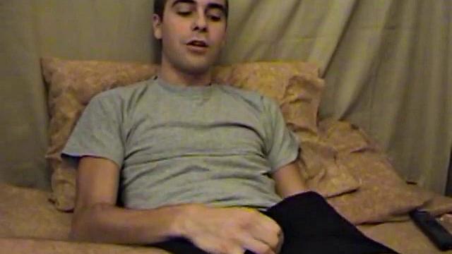 Young amateur Vincenzo takes advantage of some down time and watches a porn video. He strokes up a boner and after a jerk off session releases a high-flying cum shot.