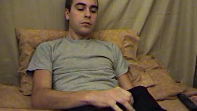 Young amateur Vincenzo takes advantage of some down time and watches a porn video. He strokes up a boner and after a jerk off session releases a high-flying cum shot.