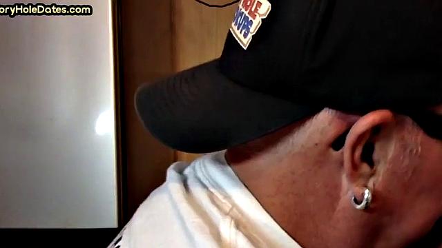 Mature DILF with glasses at gloryhole sucks neighbor's dick