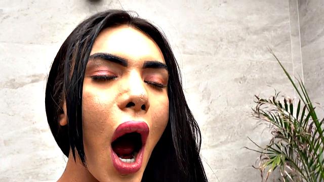 Oiled bigass TS babe at pool